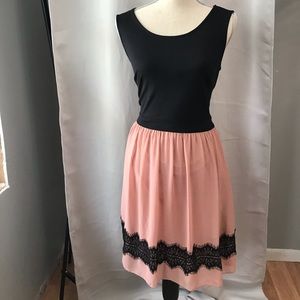 Blush and black dress